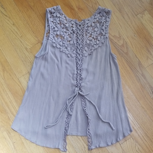 Unique sleeveless top with lace up back. - Picture 2 of 8